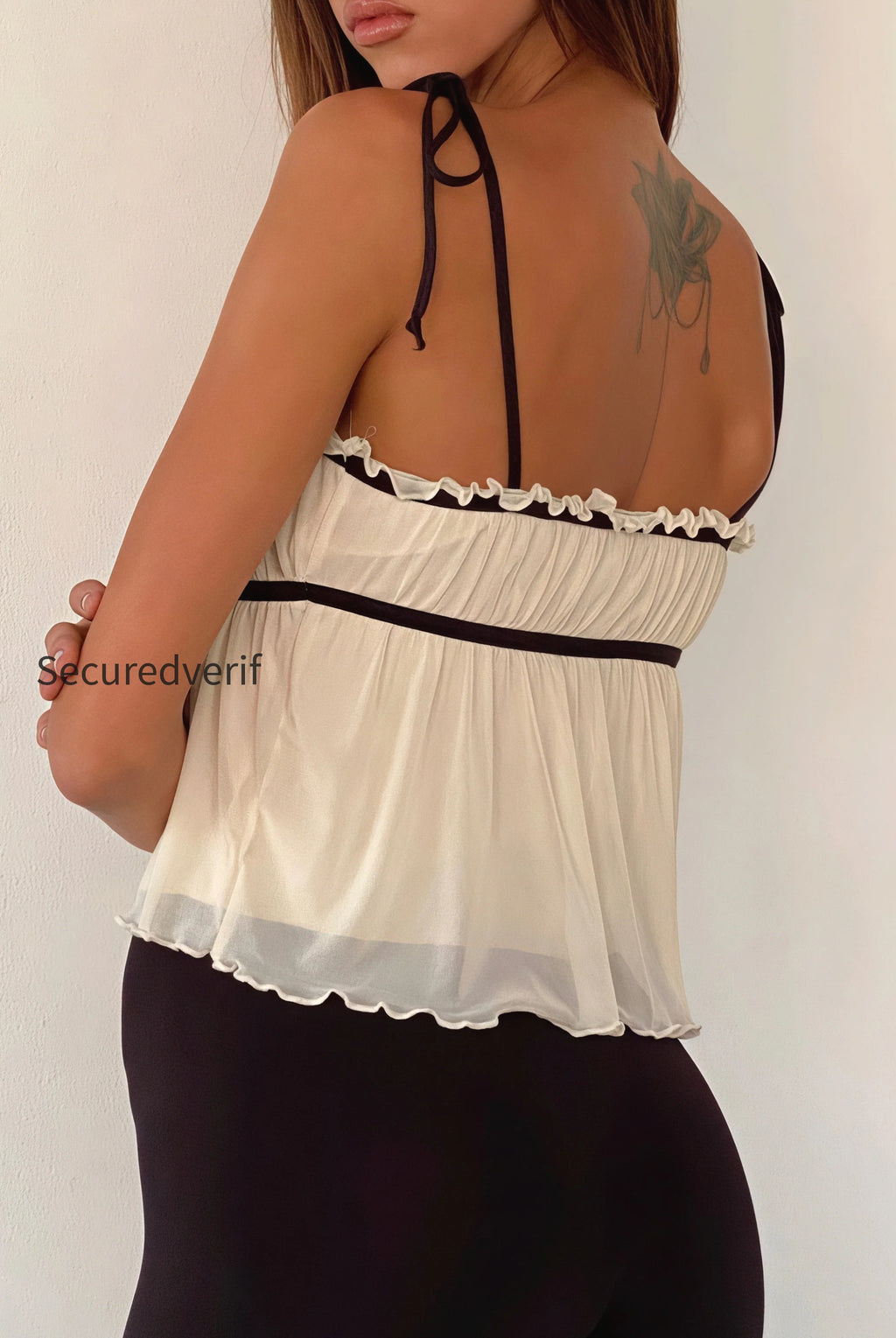 solid-ruffle-hem-tie-bow-cami-top
